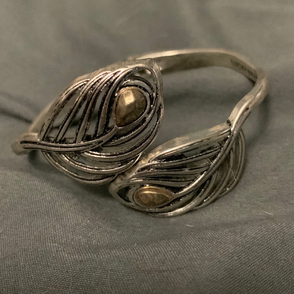 Lucky Brand bangle bracelet.  Snap feature.